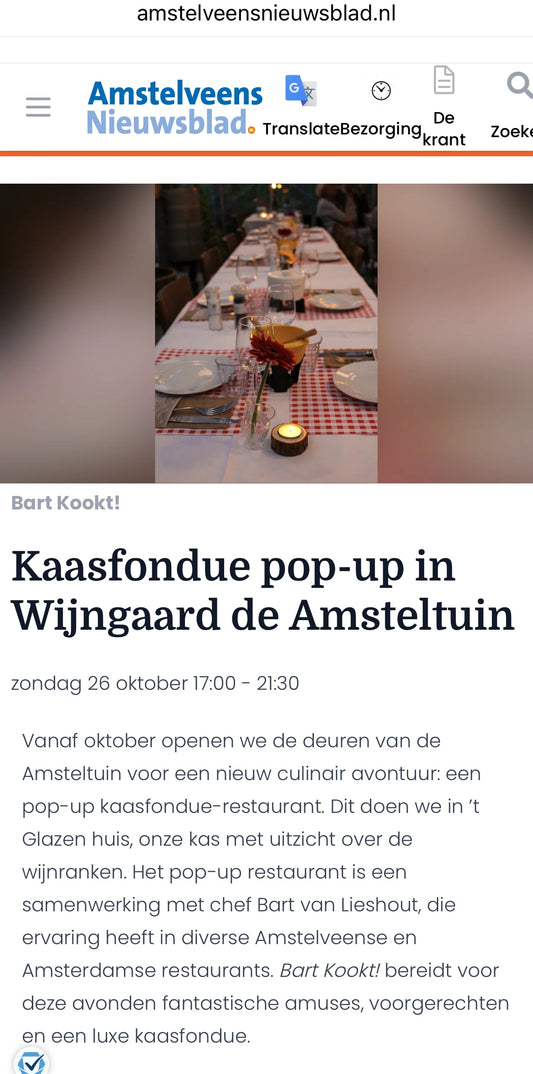 Gedekte tafel met kaasfondue in 't Glazen huis van de Amsteltuin